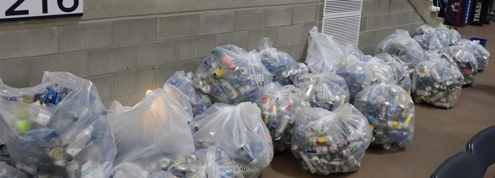 Bags of recycling after volunteers complete clean up at a basketball Green Game Day in 2024. 