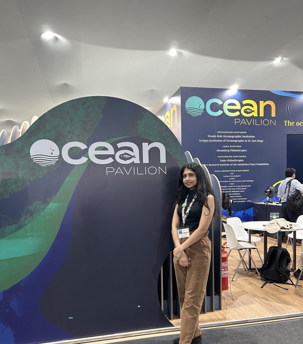 Anagha standing in front of COP30 Ocean Pavilion