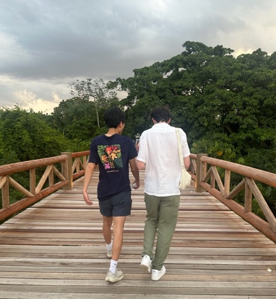 Andy and Brett walk down the canopy trail