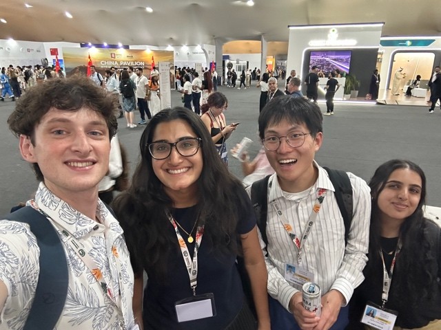 4 students smiling in COP30 blue zone